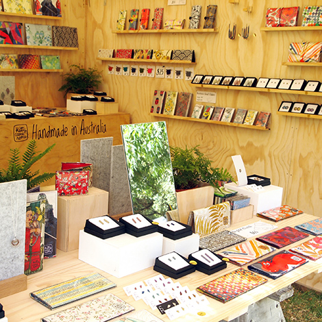 A photograph of a store with various goods lining the walls and sitting atop the table in the foreground