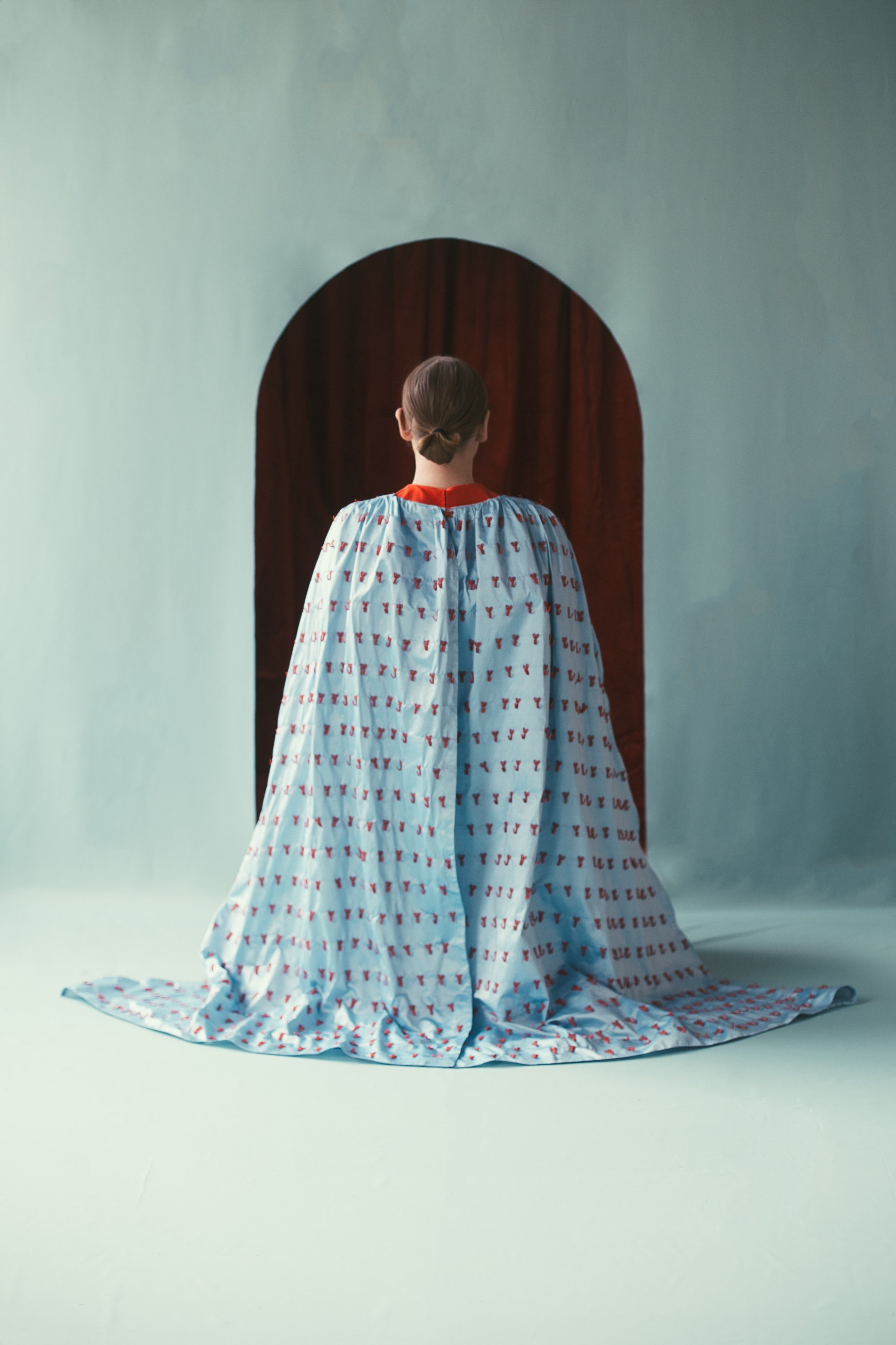 _ida-regret-HERO no blur A work by Justine Varga, a dimly lit image of a window with draping curtains